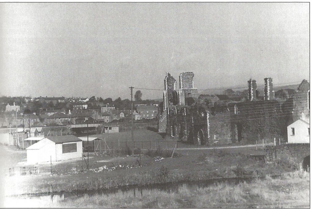 The Neath Abbey ruins with the Neath Dragons speedway stadium on the left 1960.