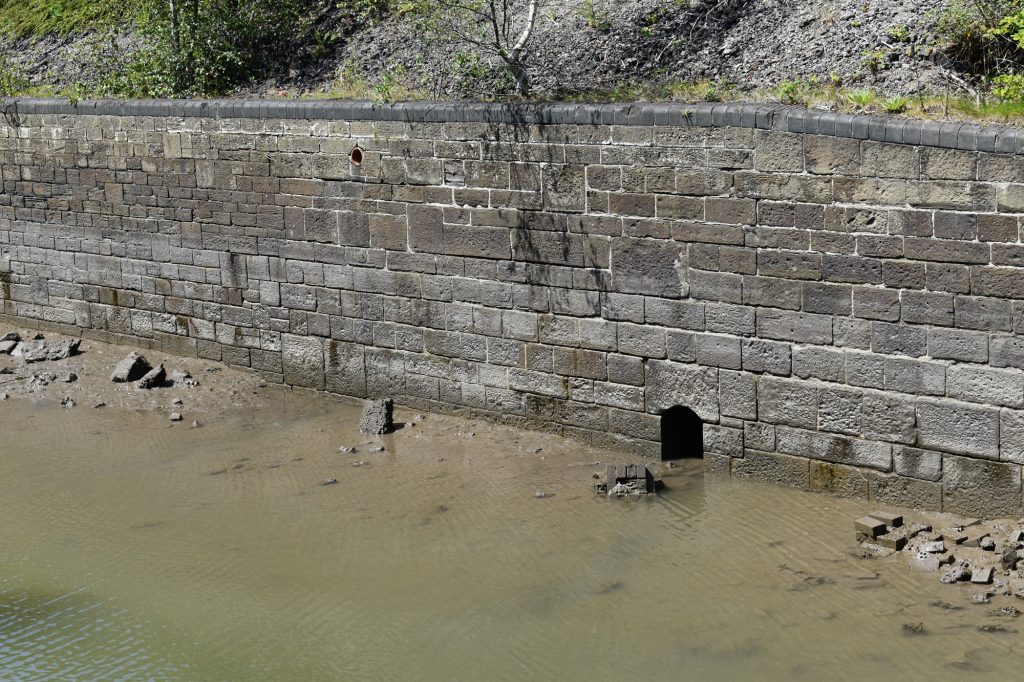 Red Jacket Pill retaining wall built late 1800s