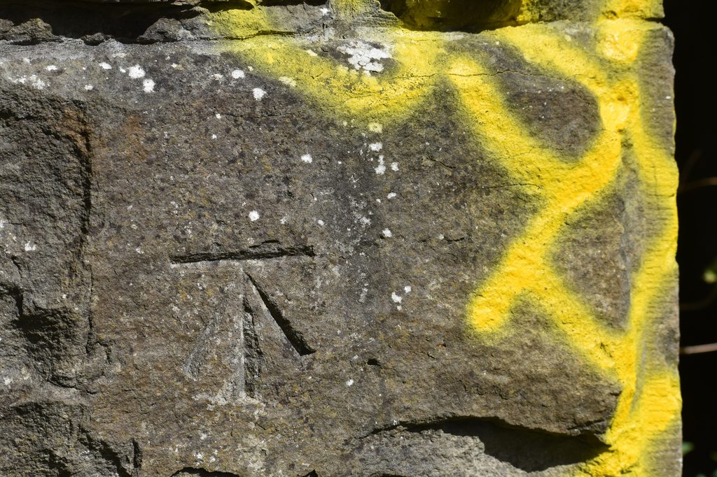 Carved into the stone in the 19th century, this Ordnance Survey mark
